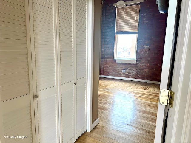 325 Lafayette St Unit 3303, Bridgeport, CT 06604 - corridor featuring light wood-style floors and brick wall