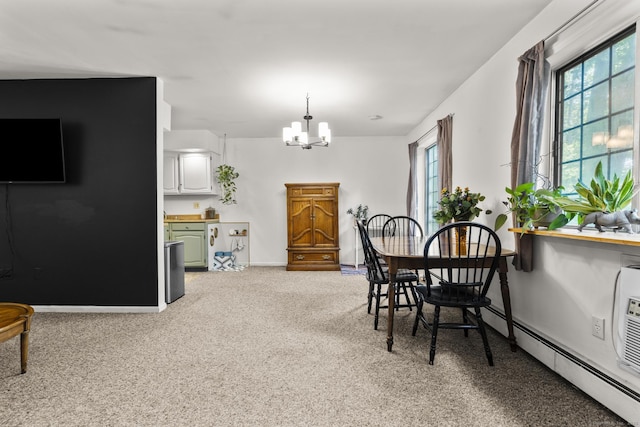 8 Carlisle Ct Unit 8, Brookfield, CT 06804 - dining space featuring a chandelier, healthy amount of natural light, a baseboard heating unit, and light carpet