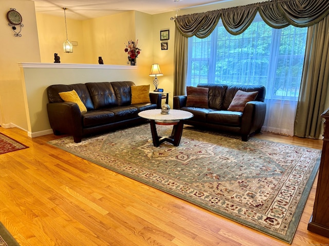 168 Cooper Ln, Hamden, CT 06514 - living area featuring wood finished floors and baseboards