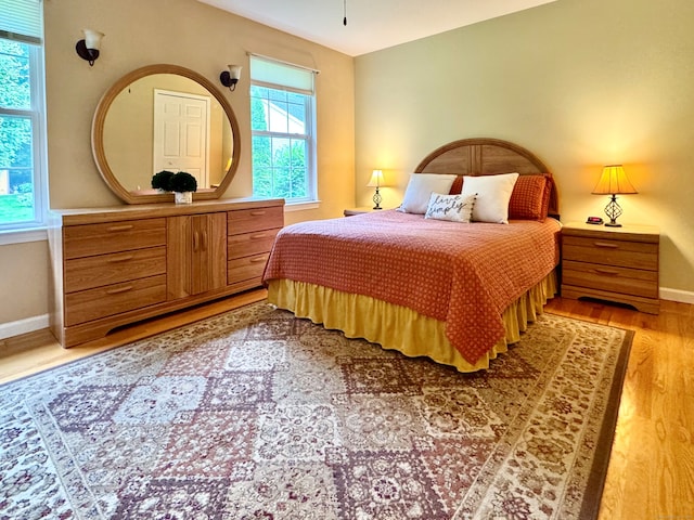 168 Cooper Ln, Hamden, CT 06514 - bedroom featuring light wood-style floors and baseboards