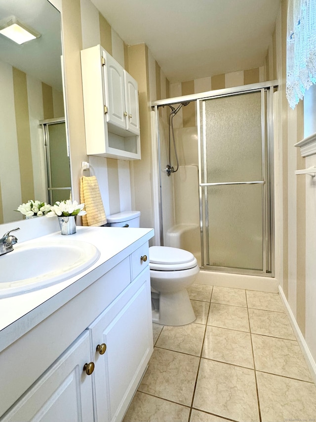 168 Cooper Ln, Hamden, CT 06514 - full bath with vanity, a shower stall, and tile patterned flooring