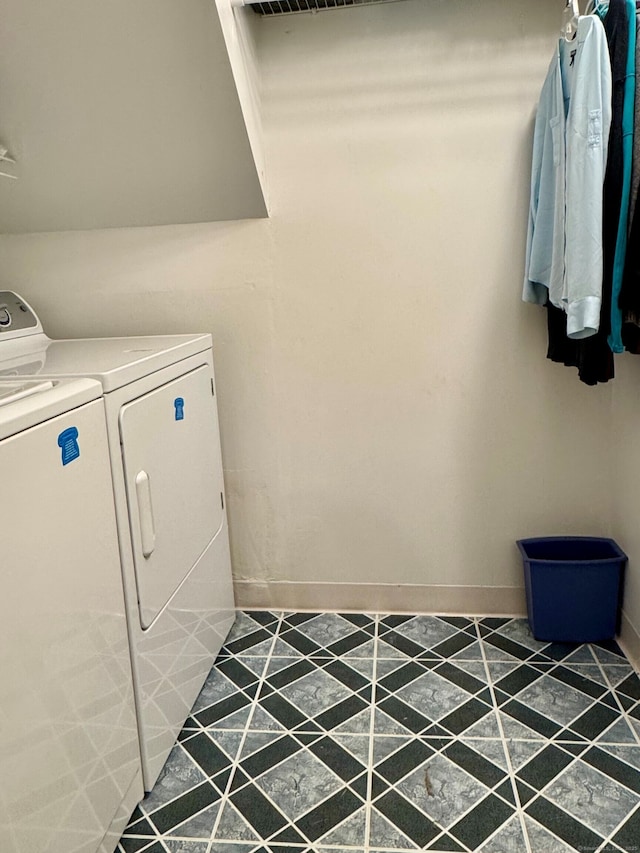 168 Cooper Ln, Hamden, CT 06514 - laundry area with independent washer and dryer and baseboards
