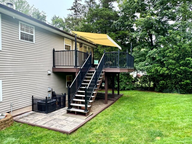 168 Cooper Ln, Hamden, CT 06514 - view of green lawn with a deck, a patio, and stairway