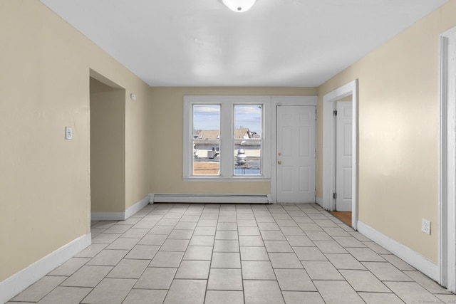122 Derby Ave, New Haven, CT 06511 - empty room featuring baseboard heating and light tile patterned floors
