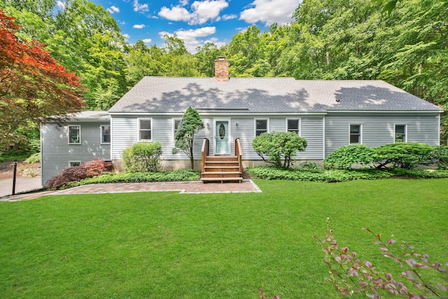 431 Fan Hill Rd, Monroe, CT 06468 - view of front of house with a front yard, roof with shingles, and a chimney