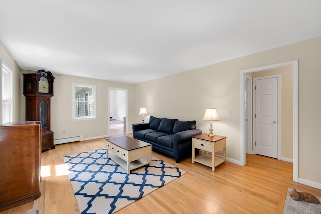 431 Fan Hill Rd, Monroe, CT 06468 - living area with a baseboard radiator and light wood-style floors