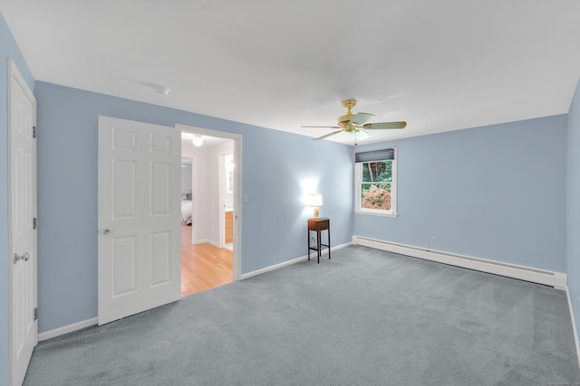 431 Fan Hill Rd, Monroe, CT 06468 - unfurnished bedroom with carpet, baseboard heating, and a ceiling fan