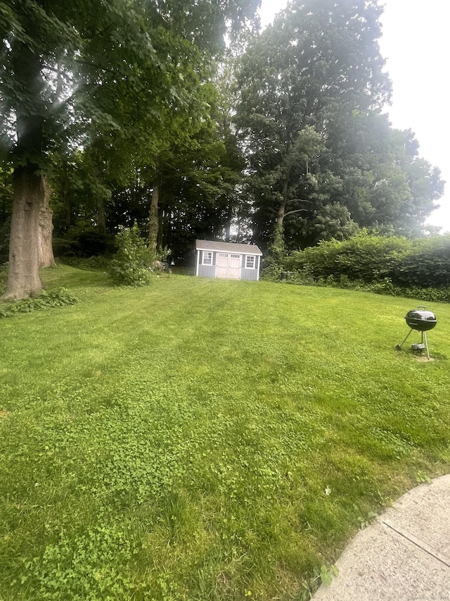40 Great Plain Rd, Danbury, CT 06811 - view of grassy yard featuring a storage shed