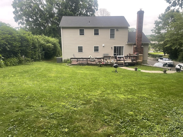 40 Great Plain Rd, Danbury, CT 06811 - rear view of property featuring a deck, a lawn, and a chimney