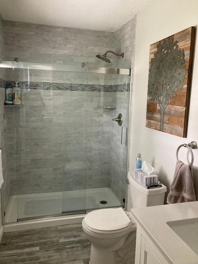 611 Overlook Path Unit 611, Southington, CT 06489 - bathroom with vanity, a shower stall, and wood finished floors