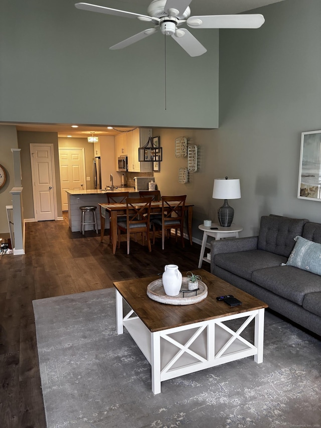 611 Overlook Path Unit 611, Southington, CT 06489 - living area featuring a towering ceiling, a ceiling fan, and dark wood-type flooring