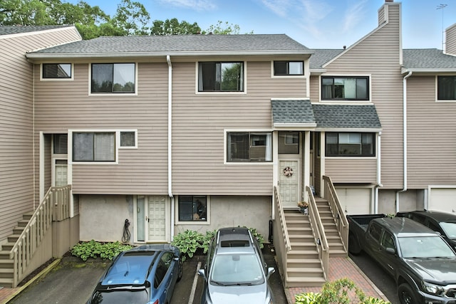 222 Sunrise Hill Rd Unit 222, Norwalk, CT 06851 - view of property featuring stairs and an attached garage