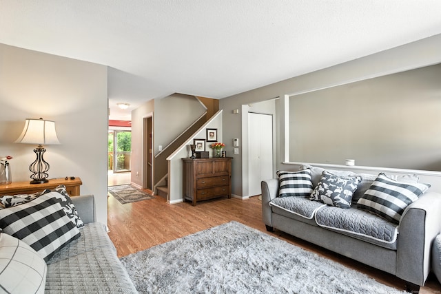 222 Sunrise Hill Rd Unit 222, Norwalk, CT 06851 - living area featuring wood finished floors and stairway
