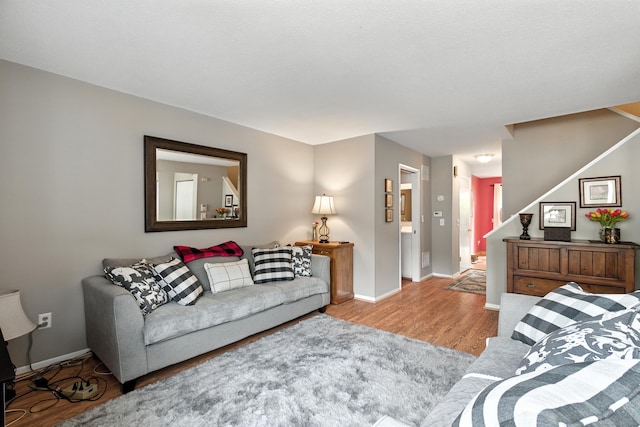 222 Sunrise Hill Rd Unit 222, Norwalk, CT 06851 - living area with wood finished floors and stairs