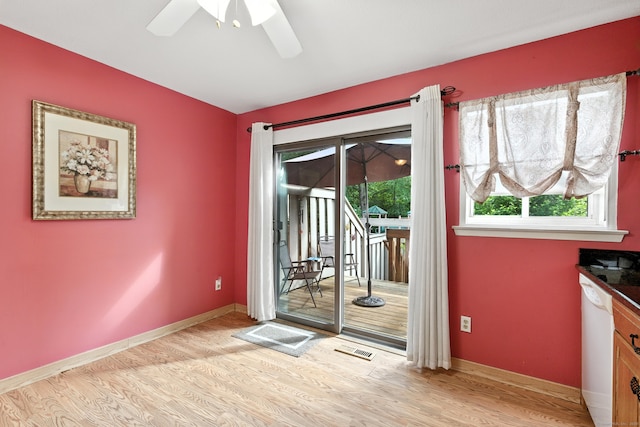 222 Sunrise Hill Rd Unit 222, Norwalk, CT 06851 - doorway with light wood finished floors, plenty of natural light, and a ceiling fan