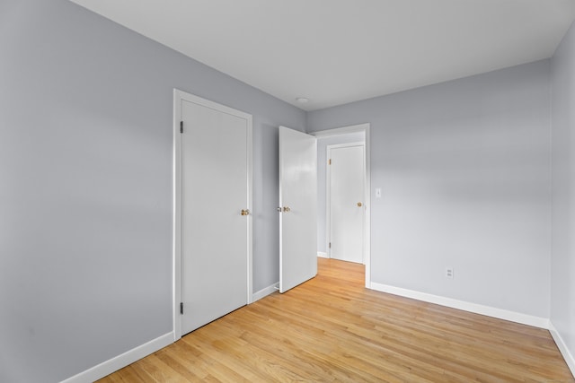538 Quaddick Rd, Thompson, CT 06277 - unfurnished bedroom with baseboards and light wood-type flooring