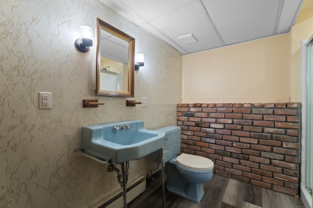 538 Quaddick Rd, Thompson, CT 06277 - bathroom featuring wood finished floors and a paneled ceiling