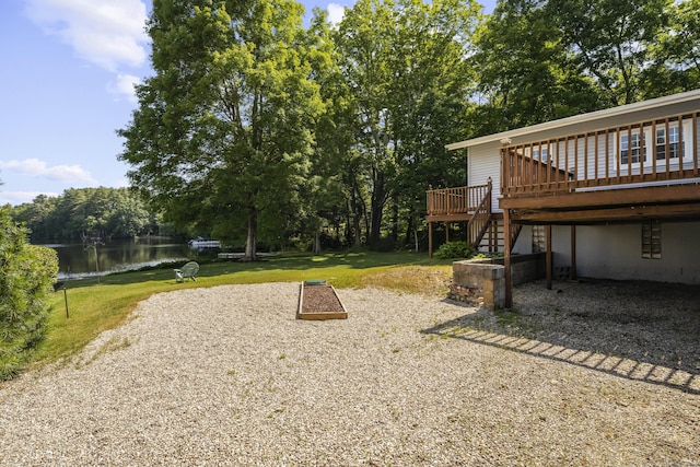 538 Quaddick Rd, Thompson, CT 06277 - view of grassy yard with a deck with water view and stairway