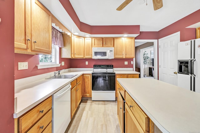 56 Stagecoach Cir, Milford, CT 06460 - kitchen featuring white appliances, a ceiling fan, light countertops, and light wood-style flooring