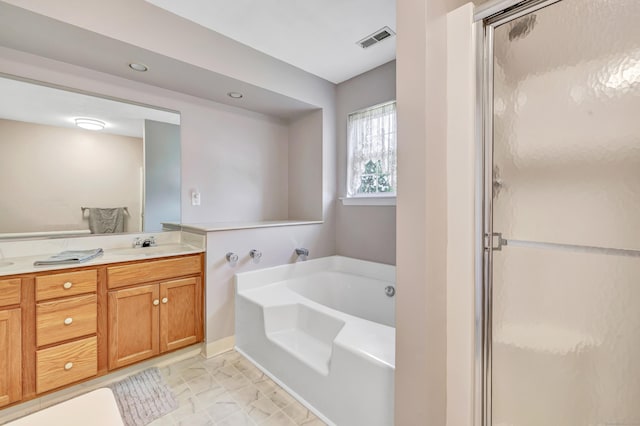 56 Stagecoach Cir, Milford, CT 06460 - bathroom featuring a bath, double vanity, a shower stall, and marble look tile flooring