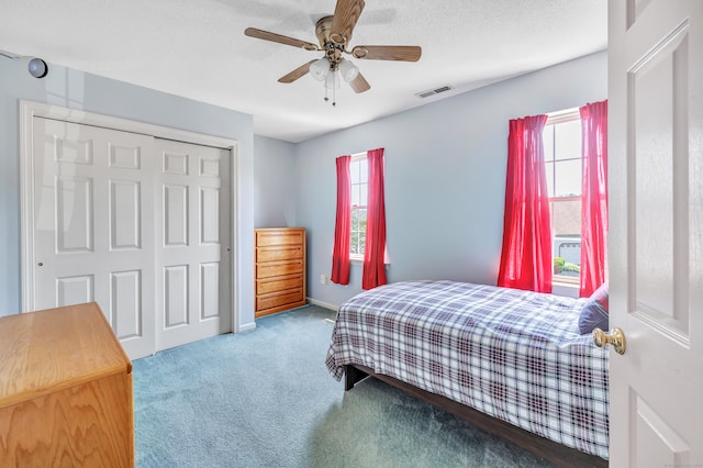 56 Stagecoach Cir, Milford, CT 06460 - bedroom with carpet floors, a closet, and a ceiling fan
