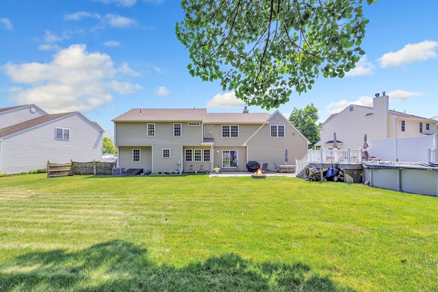 56 Stagecoach Cir, Milford, CT 06460 - rear view of house featuring a patio and a covered pool