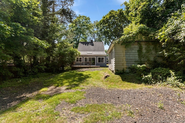 141 Cannon St, Hamden, CT 06518 - view of green lawn with a deck