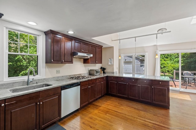 141 Cannon St, Hamden, CT 06518 - kitchen featuring stainless steel appliances, light wood-style floors, light stone countertops, under cabinet range hood, and recessed lighting