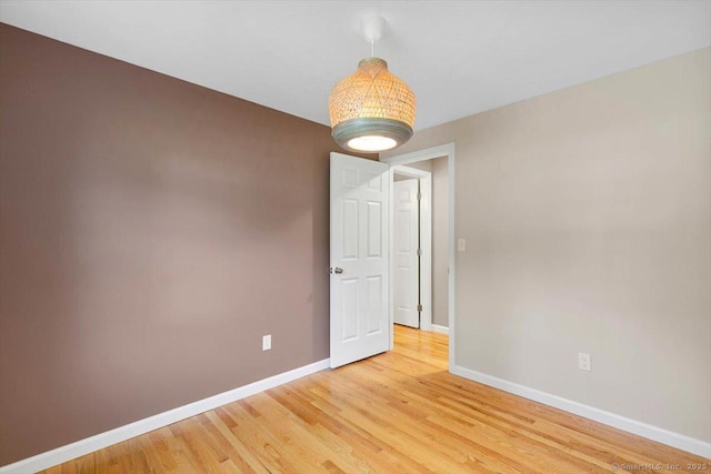2 Sunwoods Cir, Hamden, CT 06518 - unfurnished room featuring baseboards and light wood finished floors