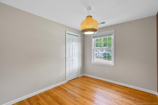 2 Sunwoods Cir, Hamden, CT 06518 - unfurnished room featuring light wood-style floors and baseboards