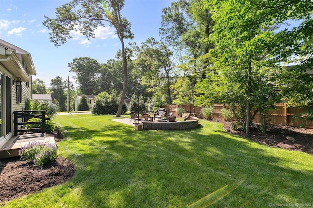 2 Sunwoods Cir, Hamden, CT 06518 - fenced backyard with a patio area