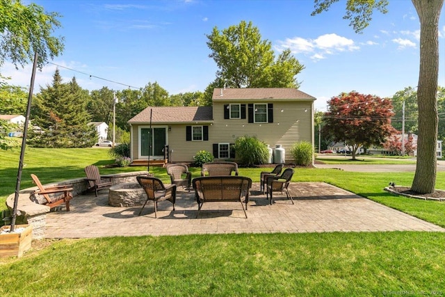 2 Sunwoods Cir, Hamden, CT 06518 - back of house with an outdoor fire pit, a lawn, and a patio area
