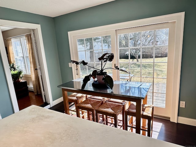 111 Spring Garden St, Hamden, CT 06517 - dining space featuring healthy amount of natural light and dark wood-type flooring
