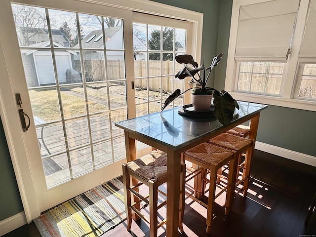 111 Spring Garden St, Hamden, CT 06517 - dining area with baseboards and wood finished floors