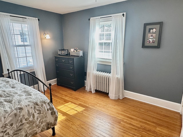 111 Spring Garden St, Hamden, CT 06517 - bedroom with radiator and light wood-style flooring