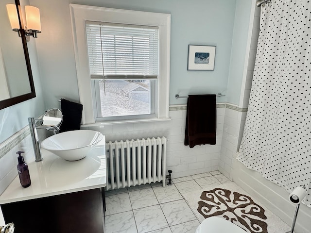 111 Spring Garden St, Hamden, CT 06517 - full bathroom featuring radiator, marble finish flooring, and vanity