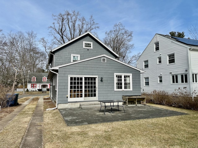 111 Spring Garden St, Hamden, CT 06517 - back of house with a patio area and a lawn