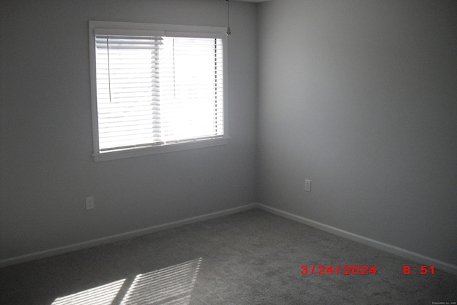1549 E Main St Unit 30, Meriden, CT 06450 - carpeted spare room featuring baseboards