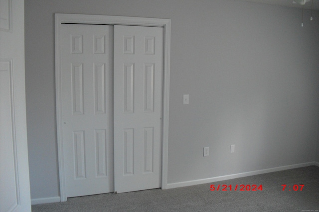 1549 E Main St Unit 30, Meriden, CT 06450 - unfurnished bedroom with carpet flooring and baseboards