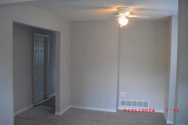 1549 E Main St Unit 30, Meriden, CT 06450 - unfurnished room featuring a ceiling fan and light colored carpet