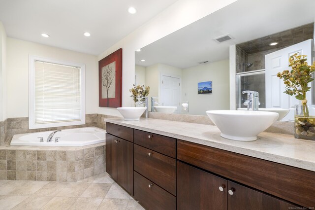 7 Castlewood Dr Unit 7, Monroe, CT 06468 - bathroom with double vanity, a bath, a shower stall, and recessed lighting