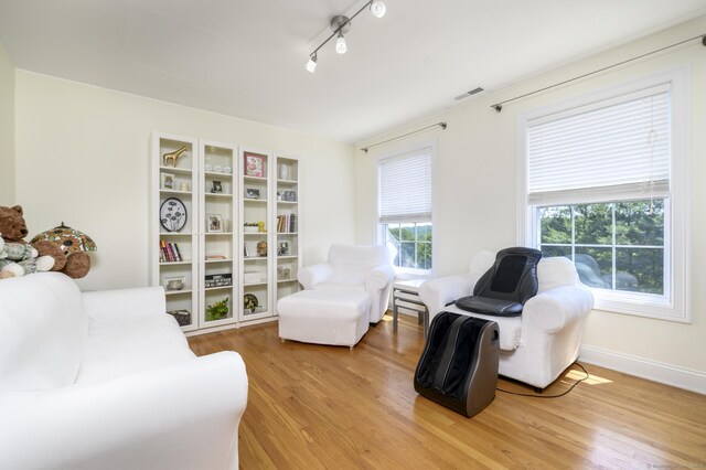7 Castlewood Dr Unit 7, Monroe, CT 06468 - living area featuring light wood-type flooring and baseboards