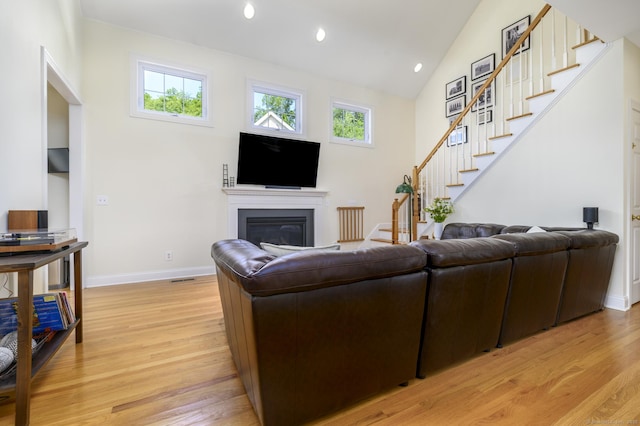 7 Castlewood Dr Unit 7, Monroe, CT 06468 - living room with light wood finished floors, plenty of natural light, stairway, recessed lighting, and lofted ceiling
