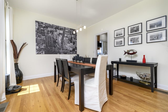 7 Castlewood Dr Unit 7, Monroe, CT 06468 - dining room featuring light wood-style flooring and baseboards