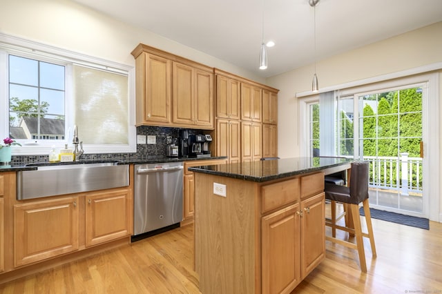7 Castlewood Dr Unit 7, Monroe, CT 06468 - kitchen featuring dishwasher, light wood-type flooring, a center island, and healthy amount of natural light