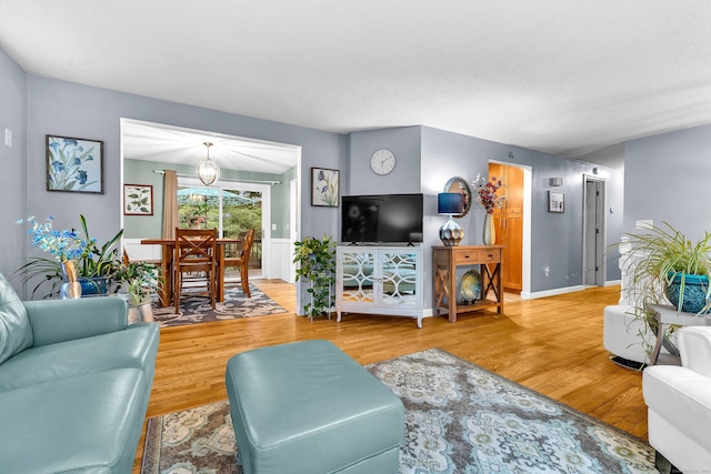 81 Charter Oak Dr, East Lyme, CT 06333 - living room featuring wood finished floors