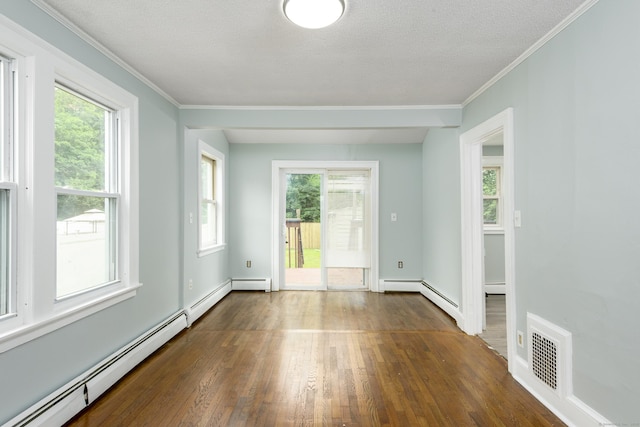 49 Olmsted St, East Hartford, CT 06108 - unfurnished room with a baseboard radiator, dark wood-type flooring, crown molding, a textured ceiling, and a baseboard heating unit