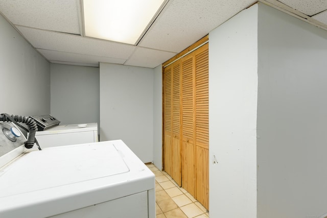 49 Olmsted St, East Hartford, CT 06108 - laundry room featuring washer and clothes dryer and light tile patterned floors