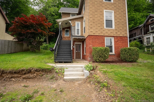 103 Clay St, Thomaston, CT 06787 - view of front of house with stairway and brick siding