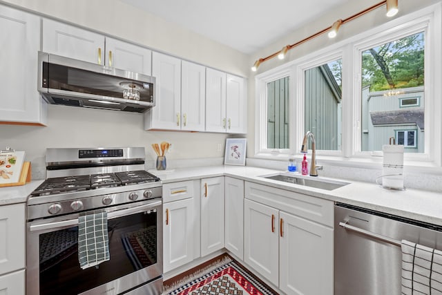 12 Byrne Ct Unit D, Farmington, CT 06032 - kitchen with stainless steel appliances and white cabinetry